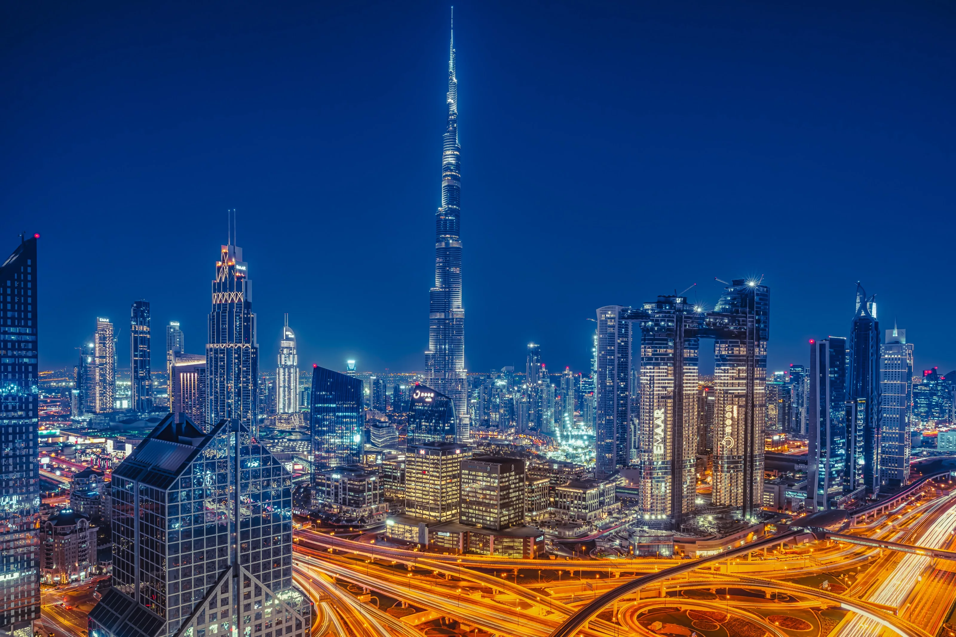 Photo of a night time landscape of Dubai City.
